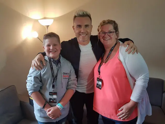 Gary Barlow with two fans