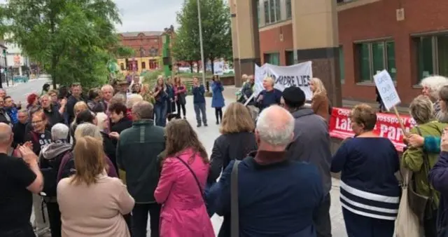 Campaigners outside court building