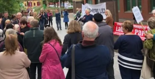 Protesters outside court