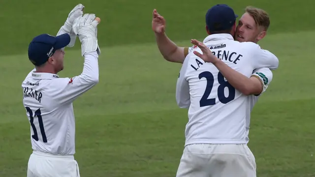 Jamie Porter takes a wicket for Somerset