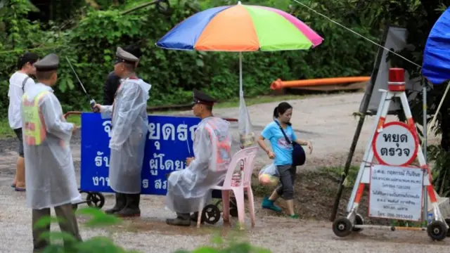 Relatives waiting at the cave