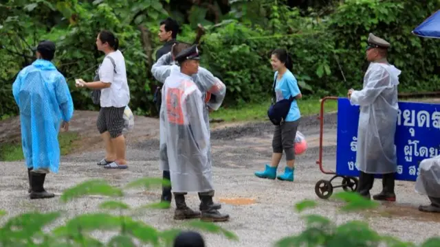 Relatives waiting at the cave