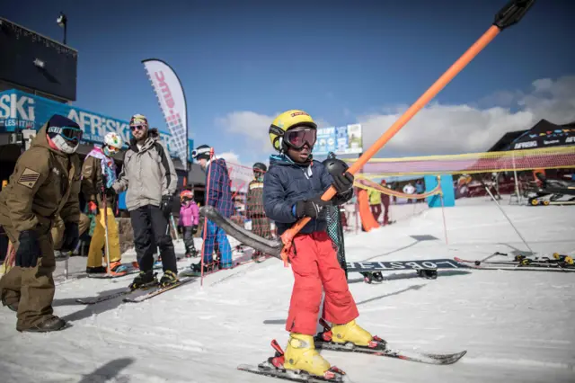 Lesotho child at a ski resort, 10 July 2018