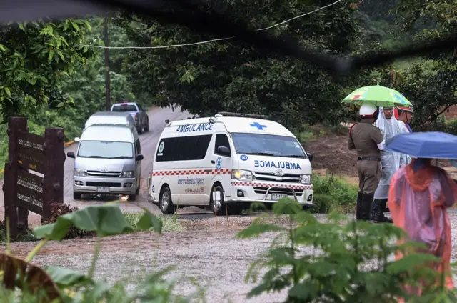 An ambulance leaves from the Tham Luang cave area