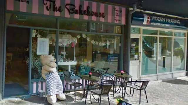 Bear outside bakery