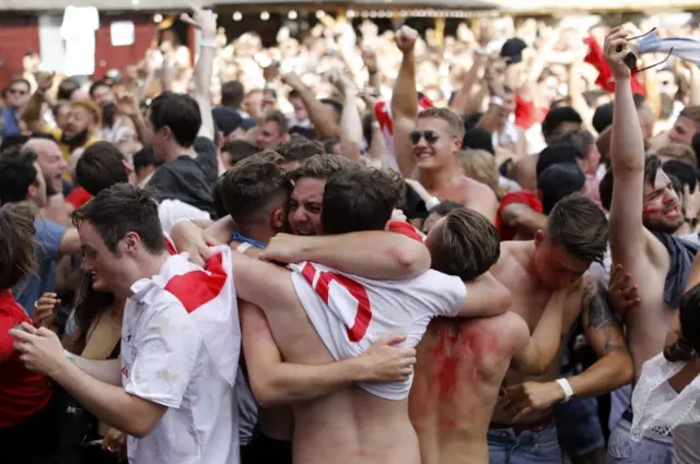 Fans celebrate getting to the semi-finals