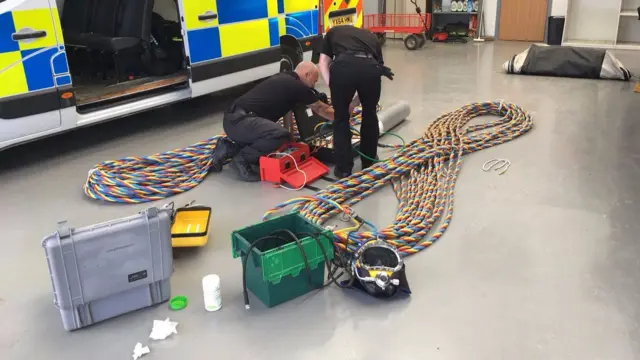 Drivers preparing their kit