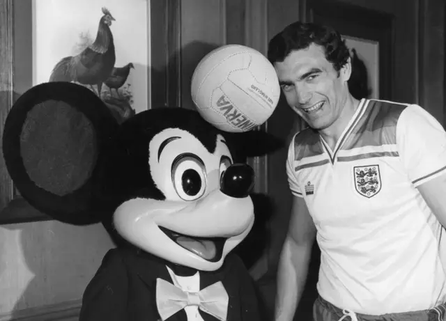 Sir Trevor Brooking and Mickey Mouse