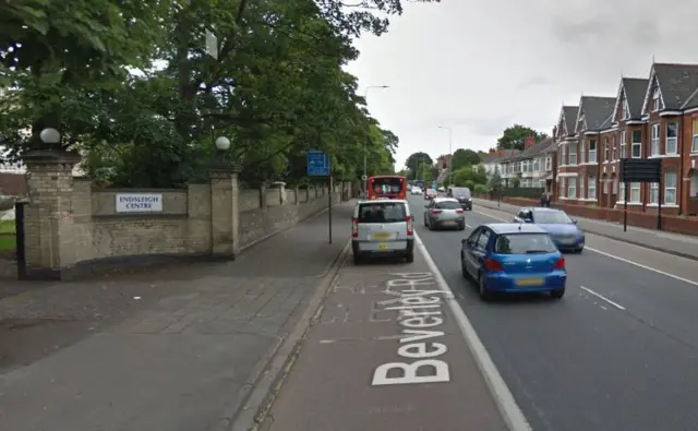 A bus and taxi in a bus lane.