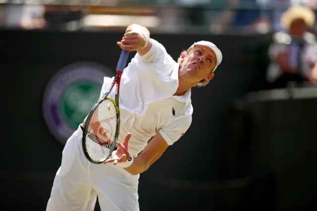 Kevin Anderson serves