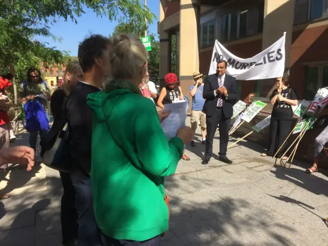 Campaigners with banners gather outside Sheffield Crown Court