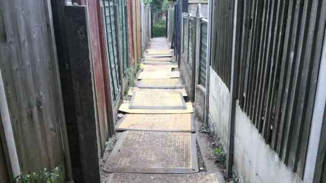 Plastic boards over the trench