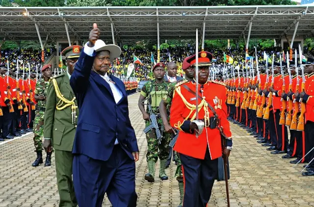 Yoweri Museveni gestures during his swearing in ceremony as newly elected President in Kampala on May 12, 2016.