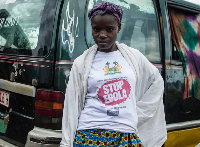 A woman wears a stop Ebola t shirt in Freetown, Sierra Leone November 3rd 2016