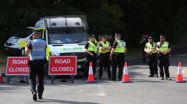 Police stood at a road block