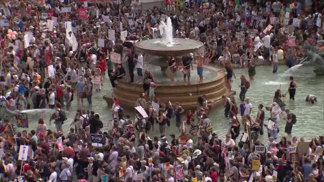 Protesters in fountains