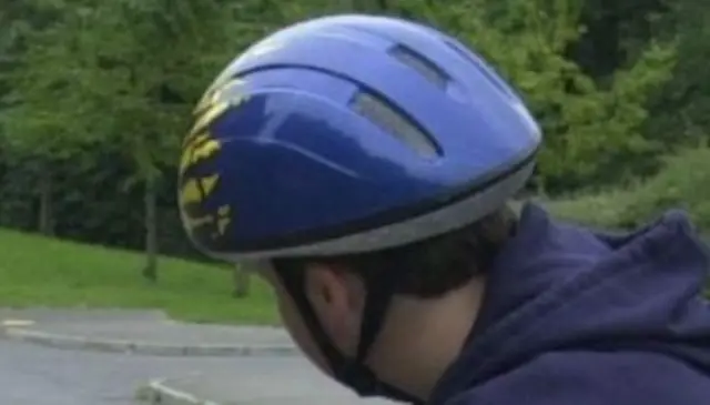 Boy with cycling helmet