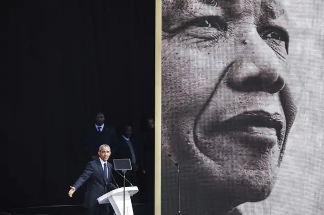 Former US President Barack Obama speaks during the 2018 Nelson Mandela Annual Lecture at the Wanderers cricket stadium in Johannesburg on July 17, 2018.