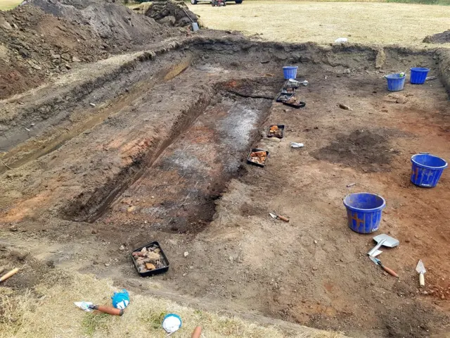 A trench being dug