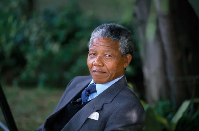 Nelson Mandela outside his Soweto home three days after his release.