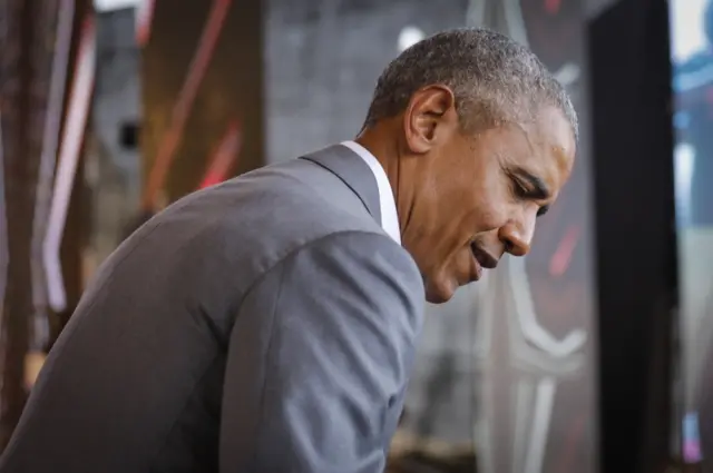 Former US president Barack Obama looks on during an opening ceremony of the Sauti Kuu Sports, Vocational and Training Centre in his ancestral home Kogelo, some 400km west of the capital Nairobi, Kenya, 16 July 2018.