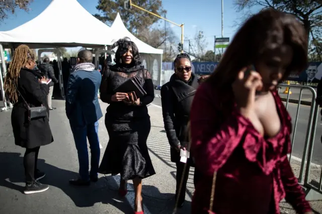 South Africans arrive at the Wanderers Cricket Stadium in Johannesburg on July 17, 2018 where the Annual Nelson Mandela Lecture will be addressed by former US president Barak Obama.