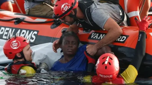 Migrants being rescued