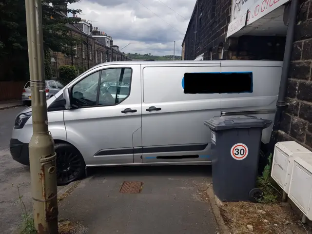 Van blocking path