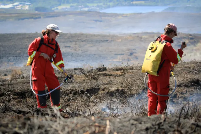 peak district staff helping put out wild fire Tameside