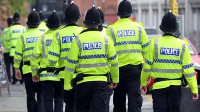 Police officers walking away