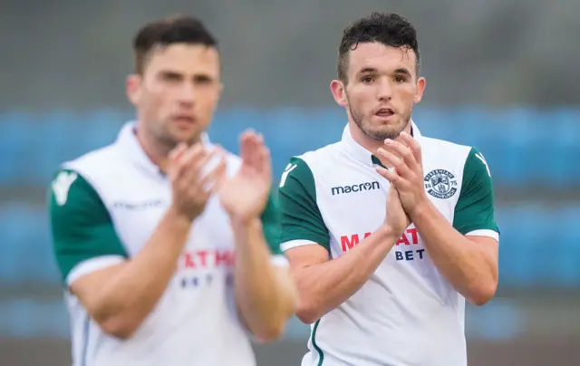 John McGinn applauds the visiting Hibs fans who made the trip to Toftir