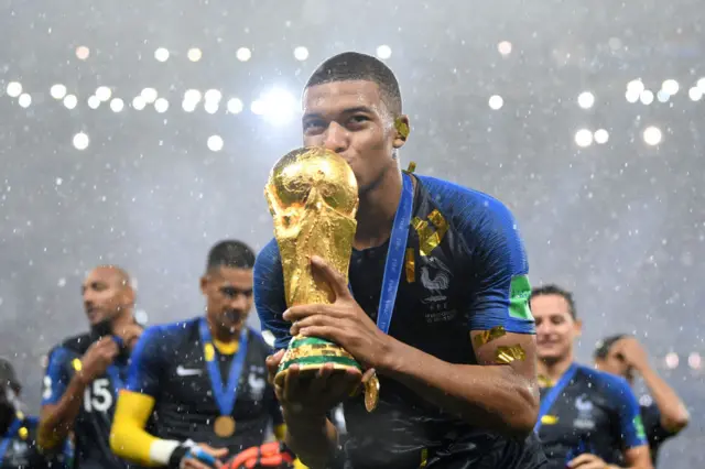 Kylian Mbappe of France celebrates with the World Cup trophy following the 2018 FIFA World Cup Final between France and Croatia at Luzhniki Stadium on July 15, 2018 in Moscow, Russia.