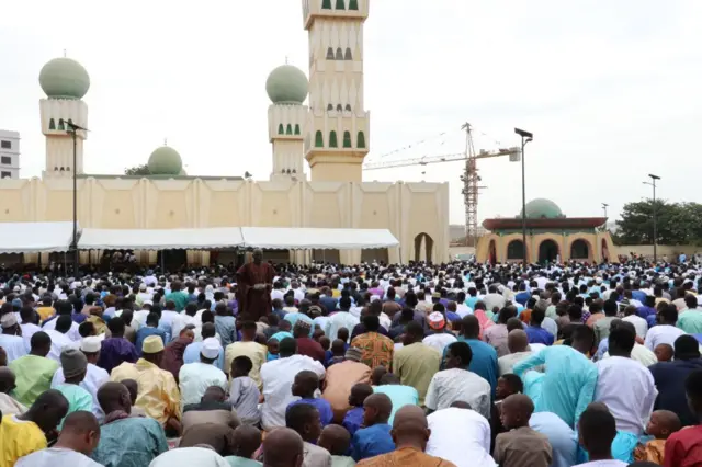 Senegalese Muslims gather to perform Eid al-Fitr prayer in Dakar, Senegal on June 15, 201