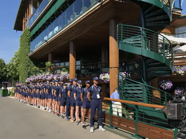 Wimbledon Ball boys and girls waiting to go out on court