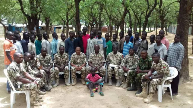 One of the photos released by the Nigerian army showing militants who surrendered