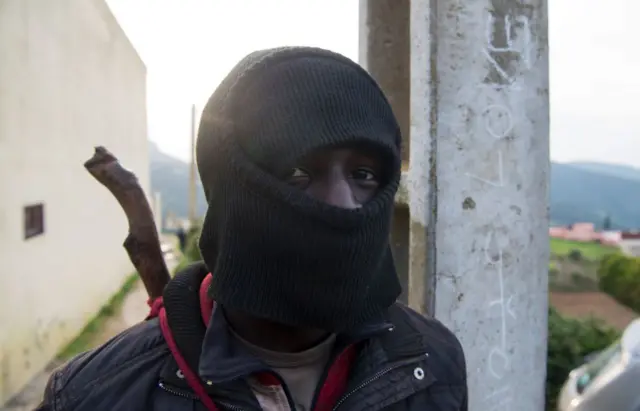 A man who has successfully crossed into Ceuta from Morocco