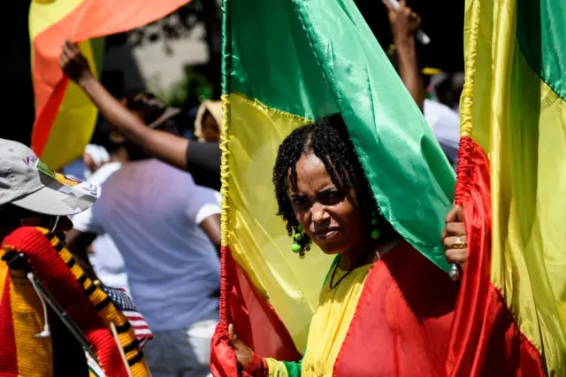 Supporters of Ethiopia's Prime Minister Abiy Ahmed rally for US support outside the State Department on June 26, 2018 in Washington, DC.