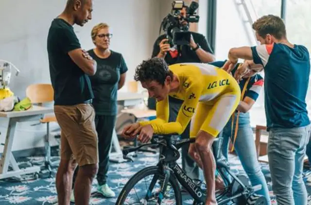 Geraint Thomas fitted with a yellow skinsuit