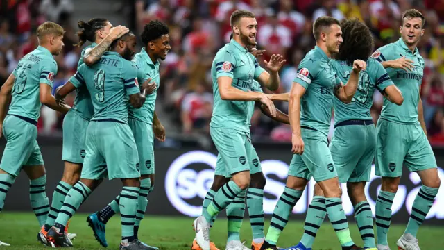 Arsenal players celebrate