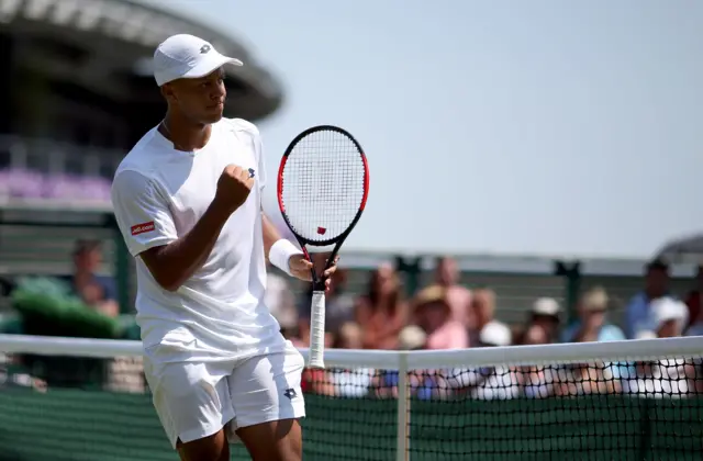 Jay Clarke raises a fist in celebration