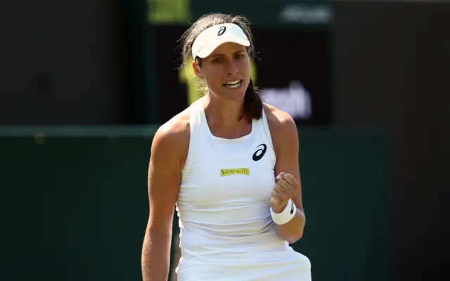 Johanna Konta celebrates winning the first set.