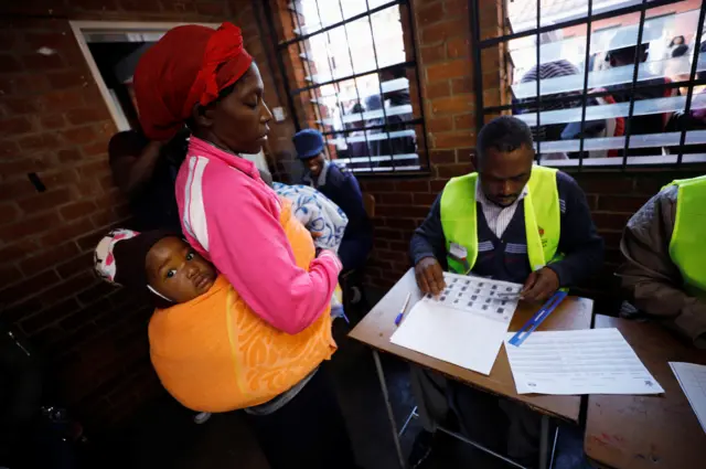 Voter at polling station