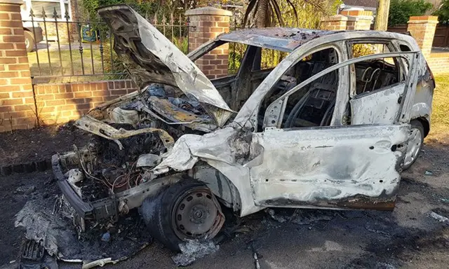 The burnt out car in Hailsham