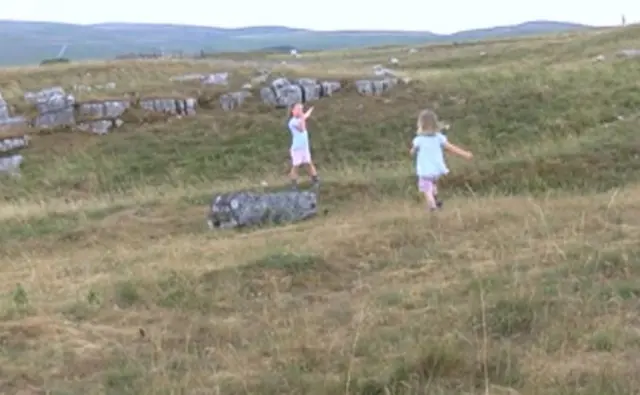 Four-year-old Georgia and her three-year-old sister, Sienna