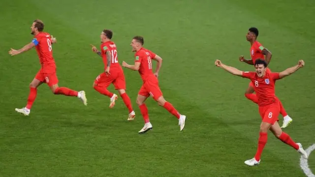 England players (l-r Harry Kane, Kieran Trippier, Jamie Vardy, Marcus Rashford and Harry Maguire) celebrate after Eric Dier of England scores the winning penalty