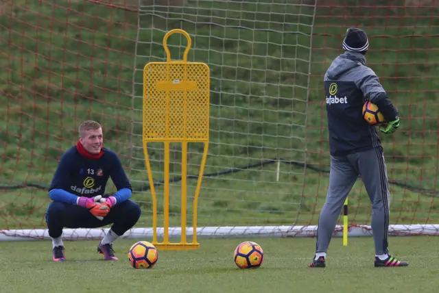 Jordan Pickford and Adrian Tucker in conversation at a Sunderland training session