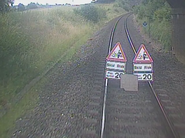 Slab and signs on the train line