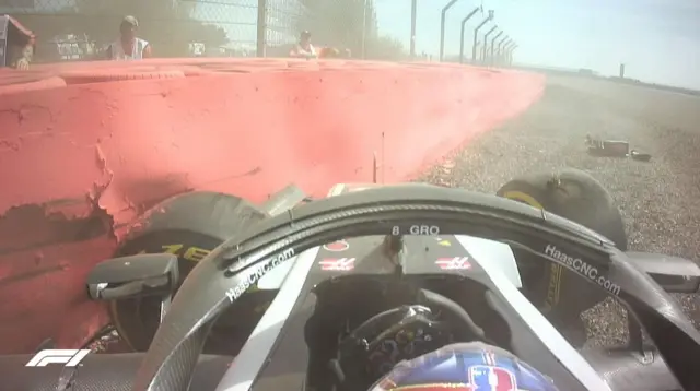 Grosjean crashes into the wall