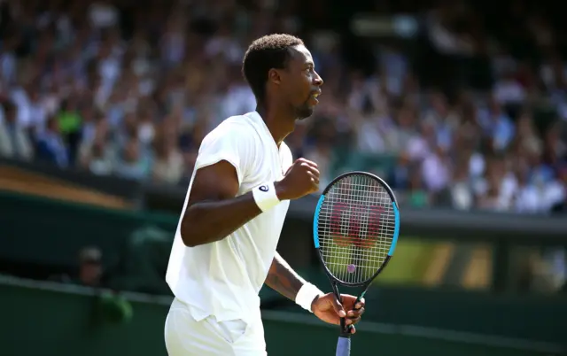 Gael Monfils fist pumps in delight.