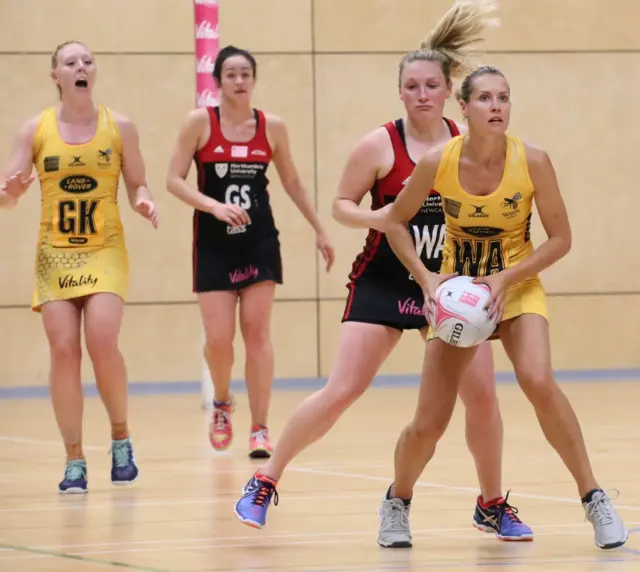 Sam May (left) and Tamsin Greenway (right) in action for Wasps Netball